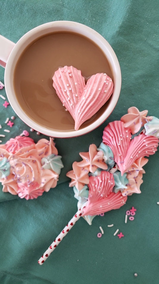Whipping up meringues for pops, kisses, cookies, rainbow roses, unicorns, flowers and more is super fun and surprisingly easy! #howto #meringues #easy #desserts