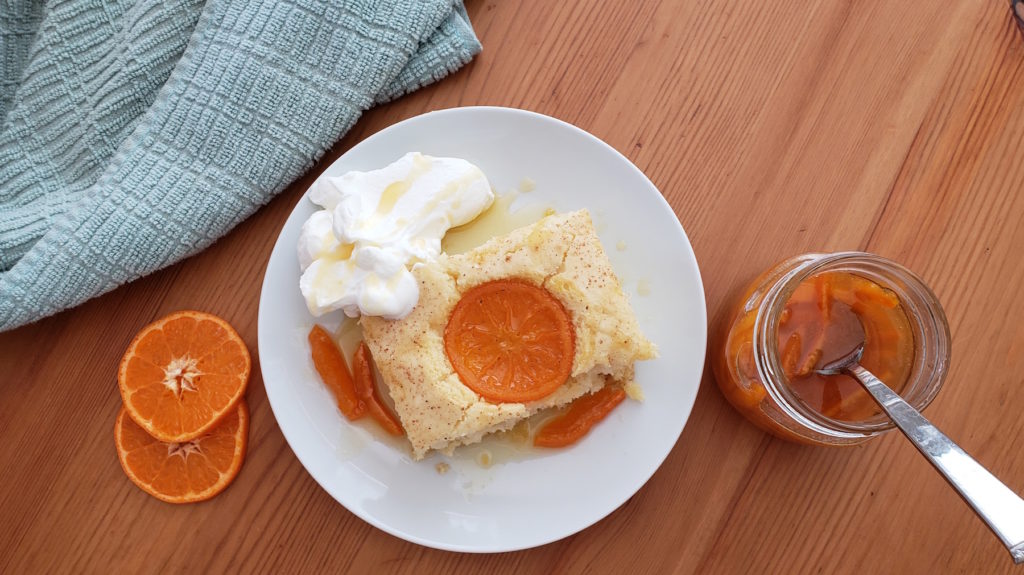 Take the hassle out of cooking breakfast for a crowd with these super easy, delightfully tasty candied orange sheet pan pancakes with warm spiced syrup.