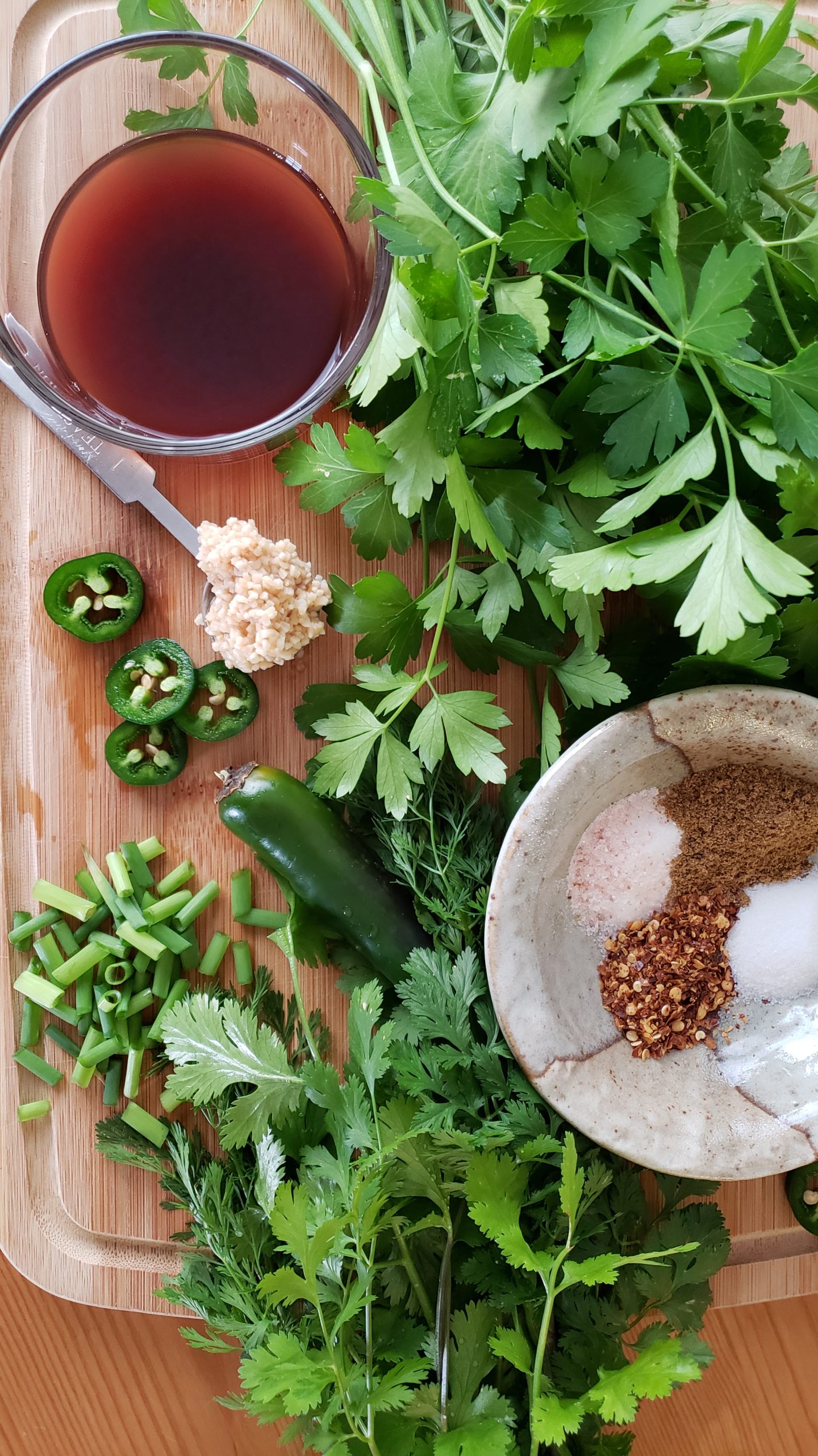 Perfect for grilled flank steaks to chicken, pork and seafood- this spicy cilantro chimichurri is sure to be your new favorite summertime sauce!