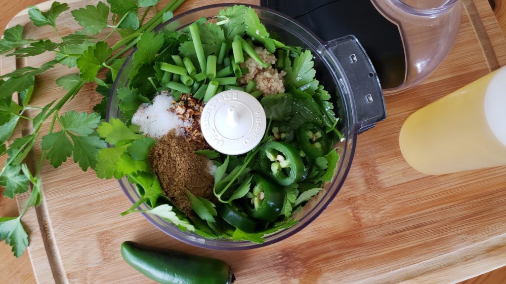 Perfect for grilled flank steaks to chicken, pork and seafood- this spicy cilantro chimichurri is sure to be your new favorite summertime sauce!