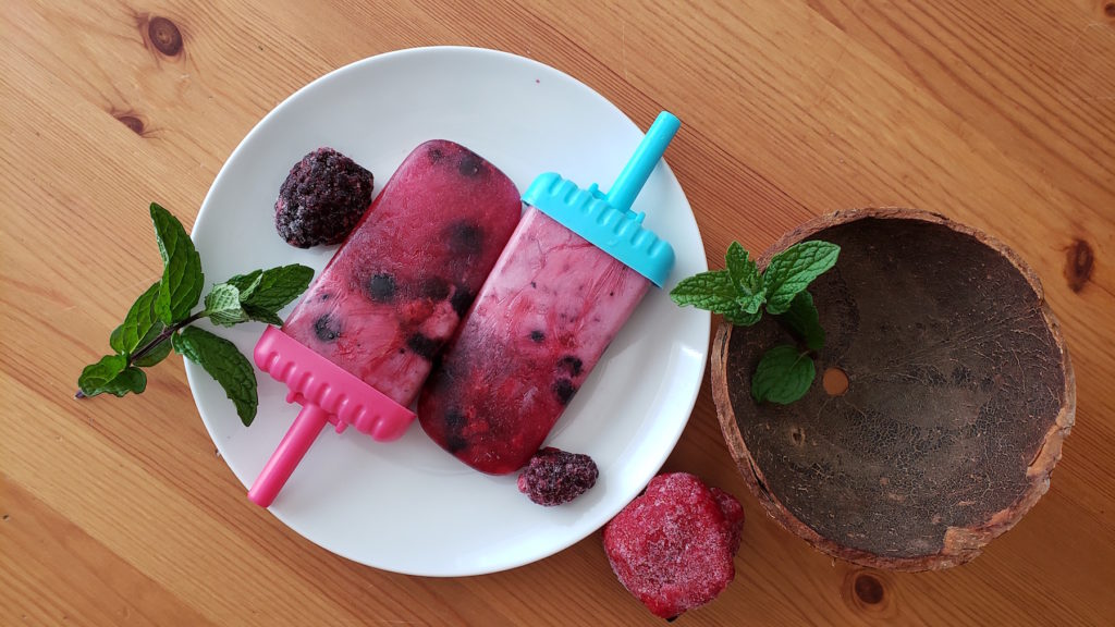 Frozen berries and coconut cream make for a quick and easy summer treat! #dairyfree #recipes #frozen #strawberry